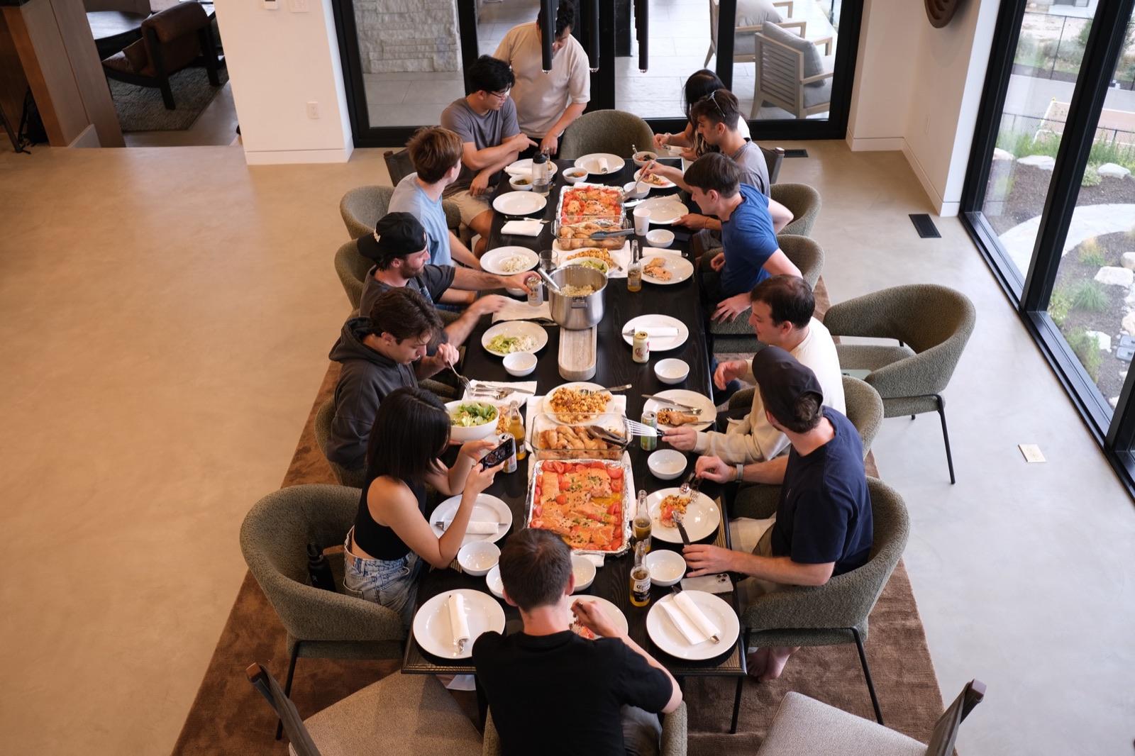 Replo teammates sharing a meal around a long table