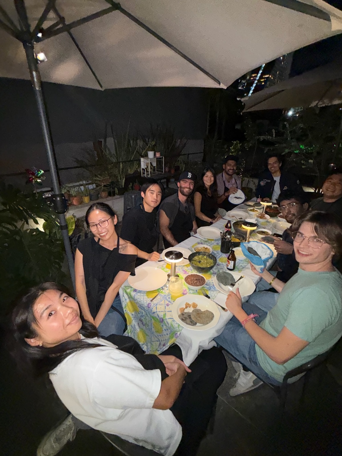 The Replo team around a rooftop dinner table in Mexico City